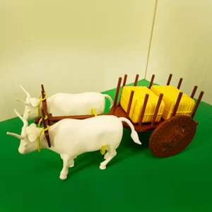 Carro de boi com dois bois e feno