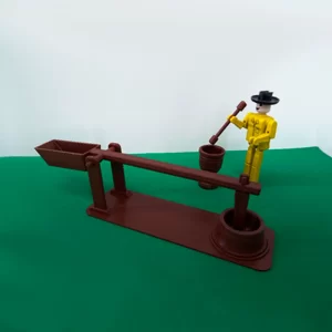 Monjolo com pilão e boneco